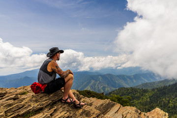 Hiker looking over Great Smoky Mountains National Park mountain range