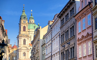 Fototapeta na wymiar The St. Nicholas Church and the streets of Prague, Czech Republic.