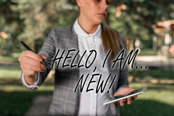 Text sign showing Hello I Am New. Business photo text used greeting or begin telephone conversation...