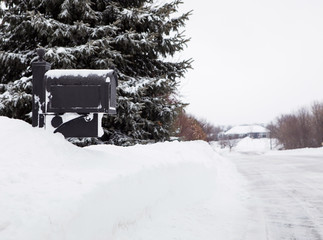 Mailbox Covered in Snow