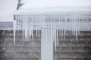 Icicles Formed on Gutters of Home