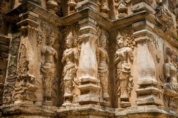 Beautiful angel sculpture around the exterior wall of Wat Jed Yod an iconic Indian style viharn with 7 chedis on top located outskirts of Chiang Mai province of Thailand. 