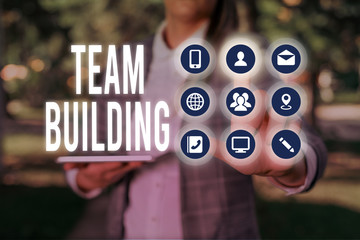 Handwriting text writing Team Building. Conceptual photo various types of activities used to enhance social relations