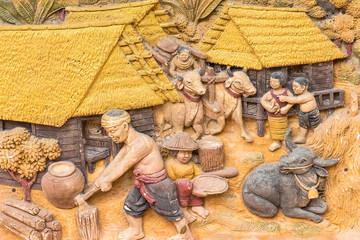 Low relief cement Thai style.