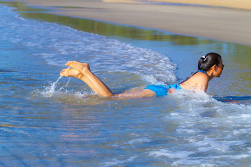 Woman and bikini blue show happy enjoy at the beach
