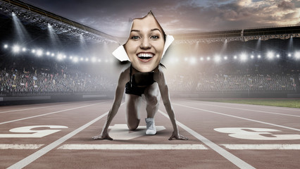 Sportswoman with a face seen from a torn paper hole