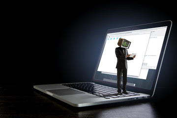 Businessman with computer head. Business efficiency concept.