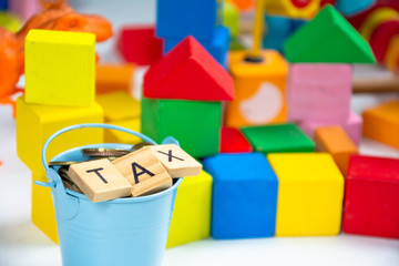 taxes or vat keyword on  toy wood block