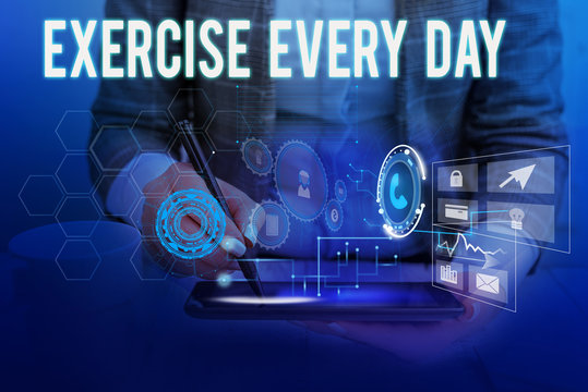 Text sign showing Exercise Every Day. Business photo showcasing move body energetically in order to get fit and healthy Woman wear formal work suit presenting presentation using smart device