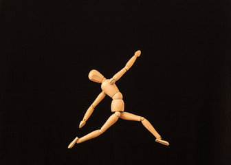 satisfaction happy wooden mannequin black background