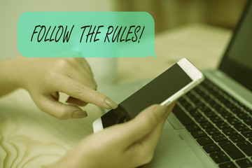 Conceptual hand writing showing Follow The Rules. Concept meaning go with regulations governing...