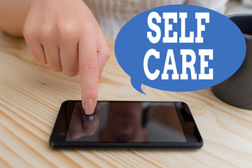 Text sign showing Self Care. Business photo text the practice of taking action to improve one s is...