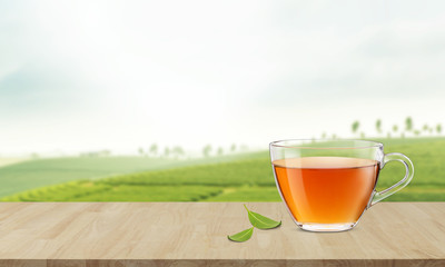 Hot cup of tea with green tea leaves on the wooden table in tea plantations, Healthy products by organic natural ingredients concept, Empty space for your text