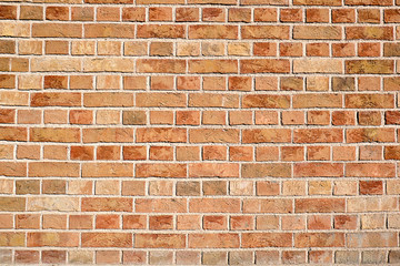 Obraz premium Background from a evenly red brick wall