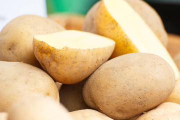 Heap of potatoes, healthy nutrition and vegetable harvest concept
