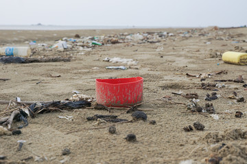 Lok Kawi, Kota Kinabalu, Sabah, Malaysia - September 08, 2019: There is a lot of rubbish left in Lok Kawi Beach. This rubbish are dumped into the sea and washed away to this beach.