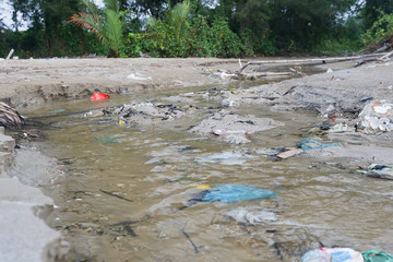 Lok Kawi, Kota Kinabalu, Sabah, Malaysia - September 08, 2019: There is a lot of rubbish left in Lok Kawi Beach. This rubbish are dumped into the sea and washed away to this beach.