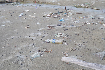 Lok Kawi, Kota Kinabalu, Sabah, Malaysia - September 08, 2019: There is a lot of rubbish left in Lok Kawi Beach. This rubbish are dumped into the sea and washed away to this beach.