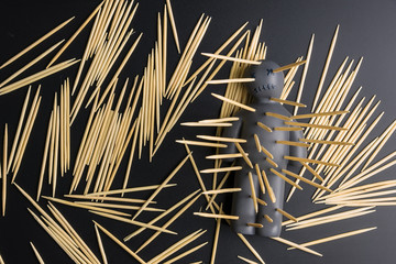 .Voodoo Doll on a black background with dramatic lighting.