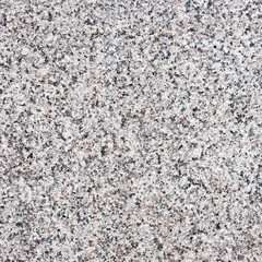 Seamless dark grey granite stone texture. Material construction.