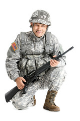 Mature male soldier on white background