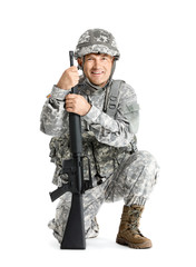 Mature male soldier on white background