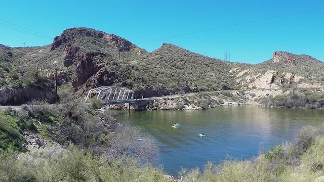 Kayakers On Canyon Lake With Truss Bridge- Arizona