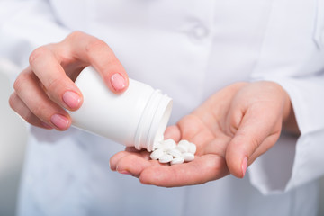 Photo of doctor prescribes pills and antibiotics