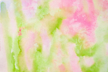 Abstract pink-green watercolor background, bright, contrast splashes, drops, smudges. Artistic background with paper texture.