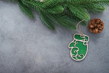 Christmas decor toys in the form of mitt and fir tree branch