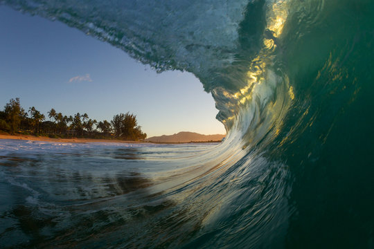 beautiful sunset wave at keiki beach in hawaii