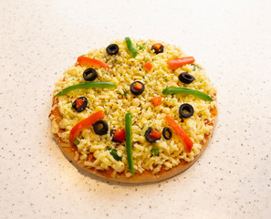 Vegetarian Delicious Capsicum Pizza Made From Capsicum, Cheese, Tomatoes, Peppers And Olives