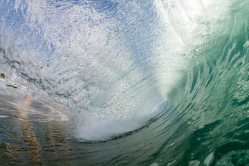 point of view inside a huge crashing wave