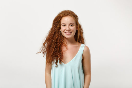 Young beautiful smiling redhead woman girl in casual light clothes posing isolated on white background, studio portrait. People sincere emotions lifestyle concept. Mock up copy space. Looking camera.