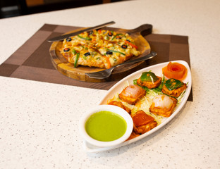 Indian Starter Dish Paneer Tikka Kabab or Paneer Cubes With Capsicum Pizza
