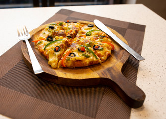 Vegetarian Delicious Capsicum Pizza Made From Capsicum, Cheese, Tomatoes, Peppers, Onions And Olives
