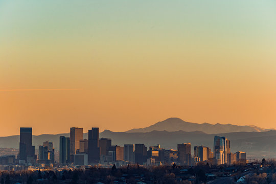 Denver skyline against a background of mountains