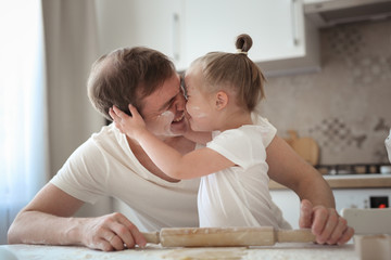 Caucasian dad and daughter with down syndrome