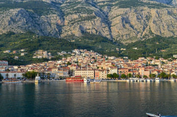 View of Makarska city center from the sea in Makarska,  Dalmatia, Croatia on June 11, 2019. 