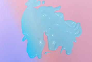 blue paint on pink background