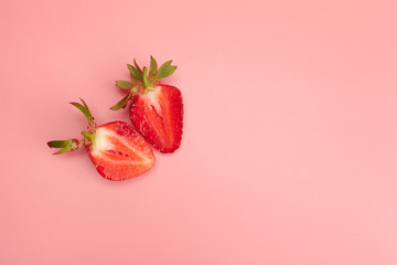 Strawberries on pink background. Fresh organic food concept