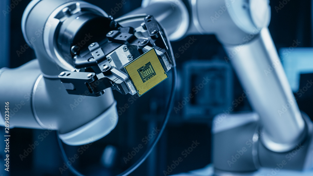 Leinwandbilder Modern High Tech Authentic Robot Arm Holding Contemporary Super Computer Processor. Industrial Robotic Manipulator End Effector Holding CPU Chip