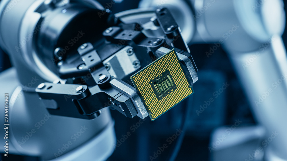 Leinwandbilder Modern High Tech Authentic Robot Arm Holding Contemporary Super Computer Processor. Industrial Robotic Manipulator End Effector Holding CPU Chip