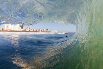 view of durban city from inside a crashing wave