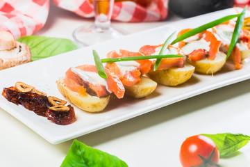 Salad of salted salmon, boiled potatoes close up