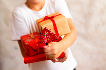 an eight-year-old boy in a Christmas hat