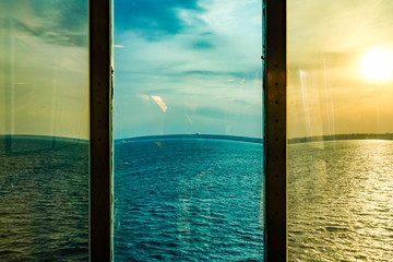 Gotland, Sweden A view through the wndows on the deck of a passenger ferry onthe Baltic Sea.