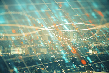 Financial graph on night city scape with tall buildings background multi exposure. Analysis concept.