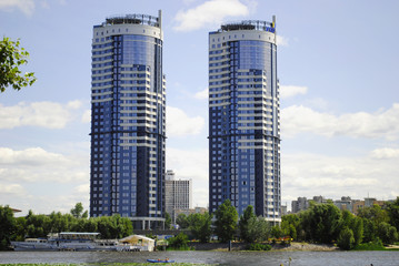 Fototapeta na wymiar Two twin skyscrapers (business center)