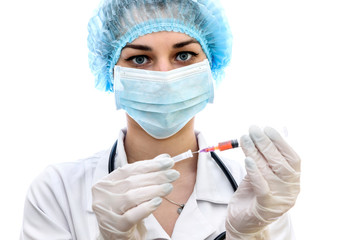 Young woman in medical uniform with syringe isolated on white